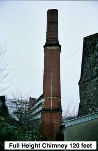 Photo of chimney in red brick, with caption
“Full Height Chimney 120 feet”