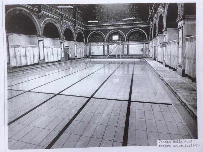 Photo of pool with tiled bottom marking out 6lanes